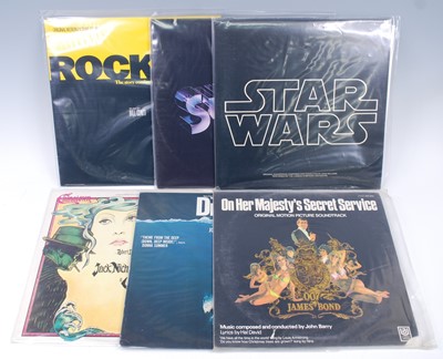 Lot 1043 - A collection of LP's being film soundtracks,...