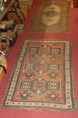 Lot 1219 - A Turkish woollen red ground hall rug, with...