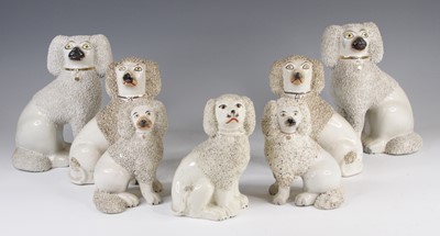 Lot 4056 - A pair of Victorian Staffordshire models of...