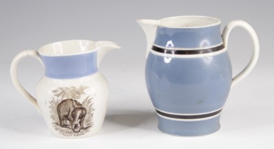 Lot 4023 - A mochaware jug, 19th century, decorated with...