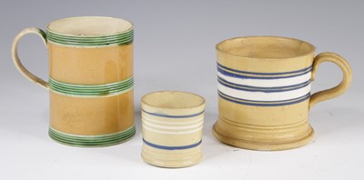 Lot 4021 - A mochaware mug, 19th century, decorated with...