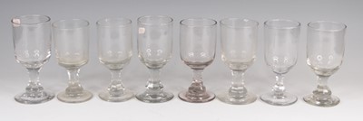 Lot 4090 - A matched set of eight Georgian glass rummers,...