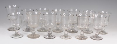 Lot 4089 - A matched set of twelve Georgian glass rummers,...