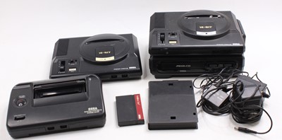 Lot 1958 - A collection of Sega related loose consoles to...