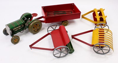 Lot 1905 - A collection of Mettoy tinplate items...