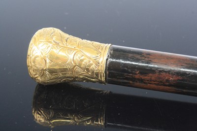 Lot 1198 - A mid-20th century walking cane, having an...
