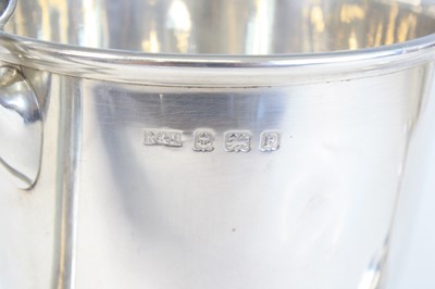 Lot 1250 - A George V silver trophy cup, of bell shape...