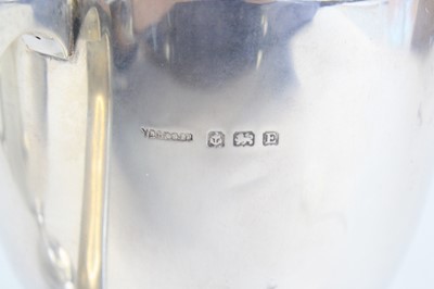 Lot 1250 - A George V silver trophy cup, of bell shape...