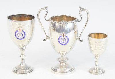 Lot 1253 - A George V. silver trophy, the wavy rim with...