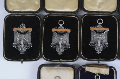 Lot 1260 - A collection of George V silver and enamelled...