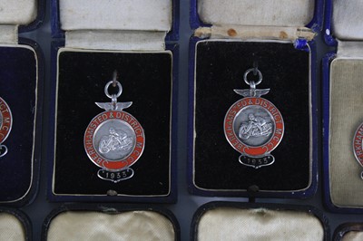 Lot 1260 - A collection of George V silver and enamelled...