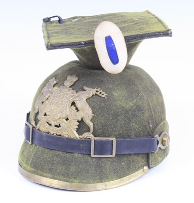 Lot 520 - A Wurttemberg Uhlan helmet, in green felt,...