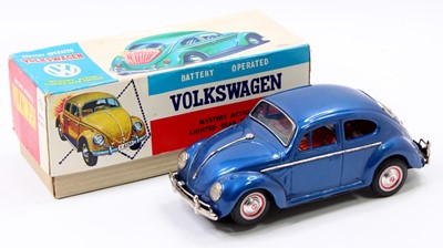 Lot 1861 - A KO Toys of Japan tinplate and battery...