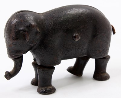 Lot 1857 - Late 19th Century cast iron walking elephant...