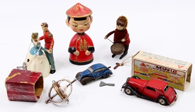 Lot 1910 - A collection of mixed novelty and tin plate...