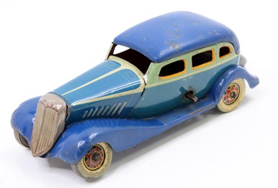 Lot 1848 - CK Toys tinplate and clockwork saloon,...
