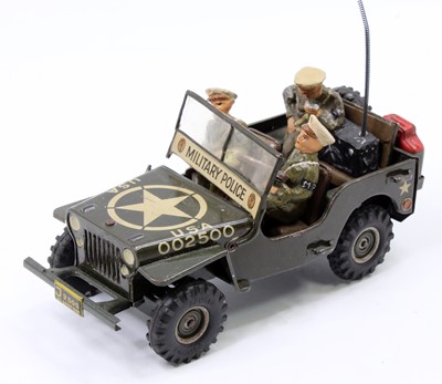 Lot 1768 - An Arnold tinplate model fo a US Military Jeep,...