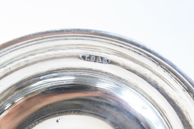 Lot 2097 - A pair of George VI silver twin-branch...