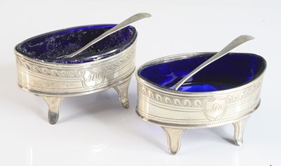 Lot 2090 - A matched pair of George III silver pedestal...