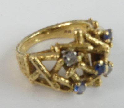 Lot 108 - An 18ct yellow gold, sapphire and diamond...