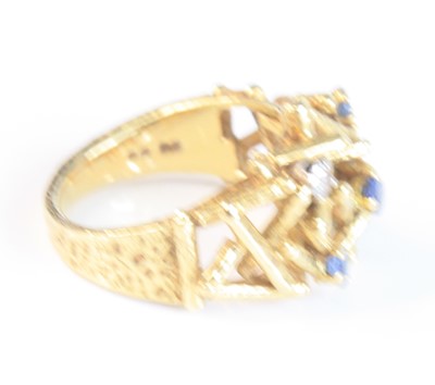 Lot 108 - An 18ct yellow gold, sapphire and diamond...