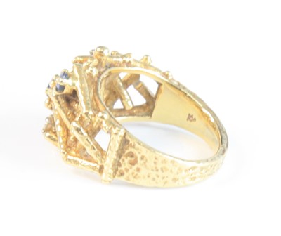 Lot 108 - An 18ct yellow gold, sapphire and diamond...