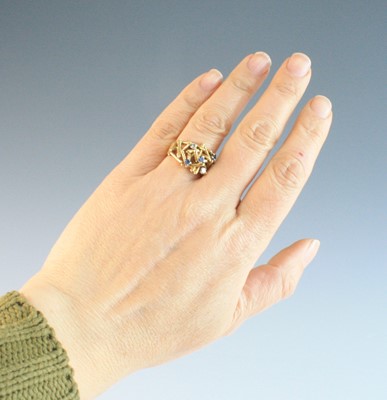 Lot 108 - An 18ct yellow gold, sapphire and diamond...