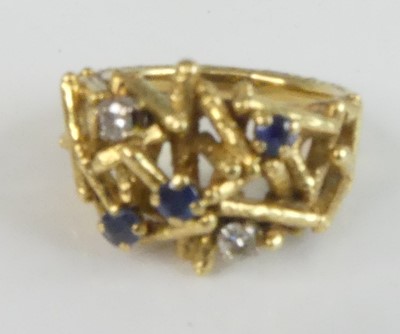 Lot 108 - An 18ct yellow gold, sapphire and diamond...