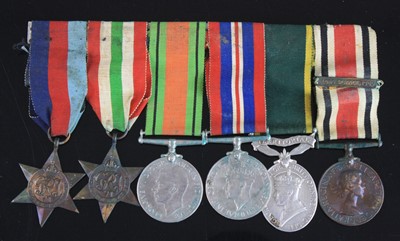 Lot 697 - A group of six medals to include 1939-1945...