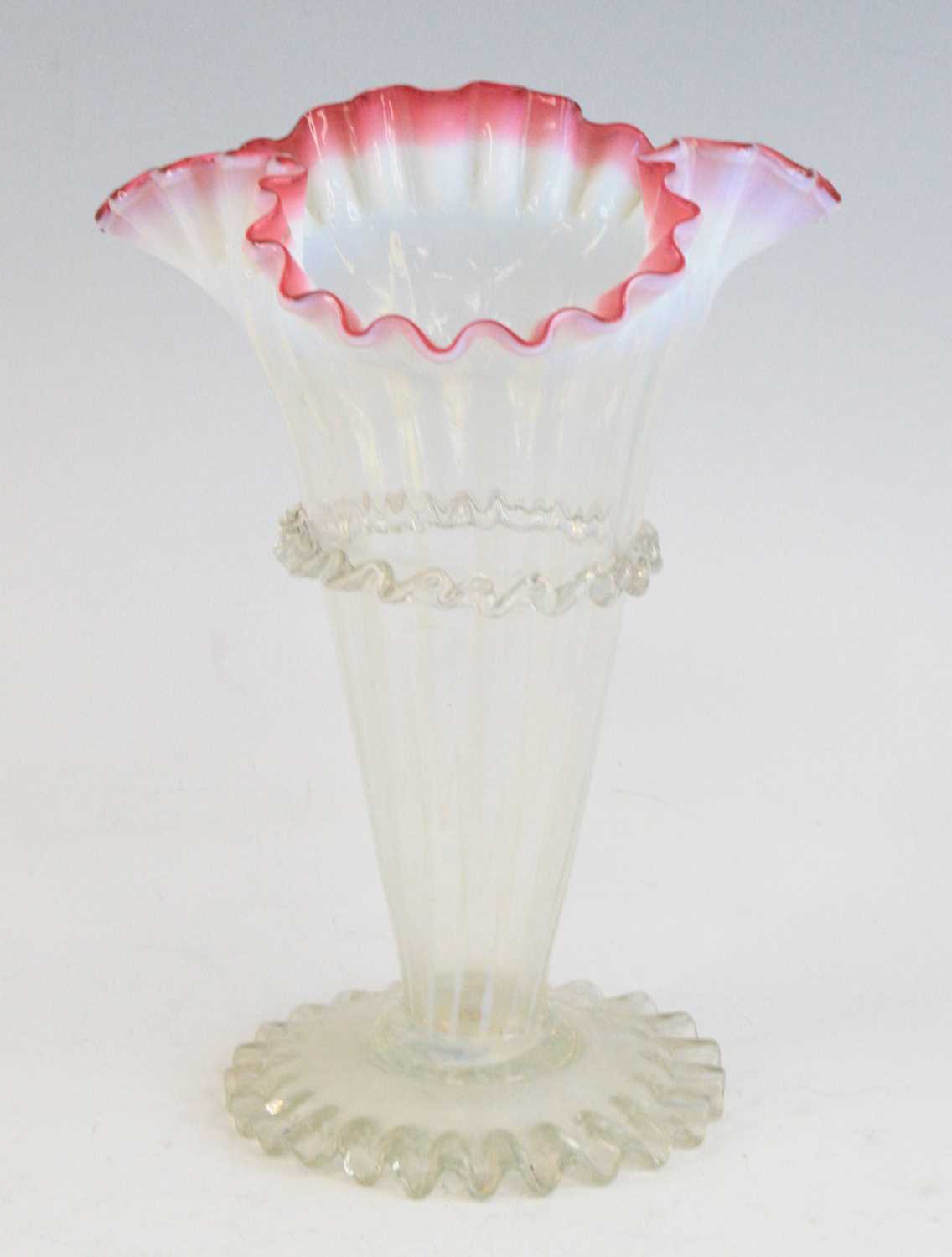 Lot 2078 - A cranberry and vaseline glass vase, 19th...