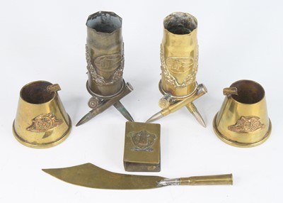 Lot 528 - A pair of WW I trench art shell cases, each...