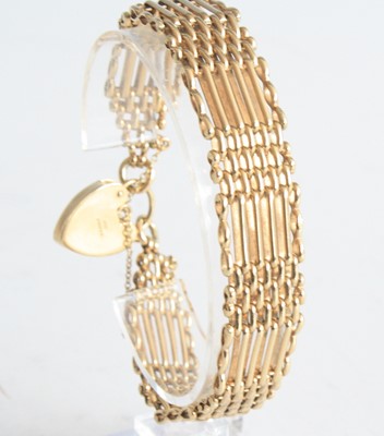 Lot 2160 - A 9ct yellow gold six bargate link...