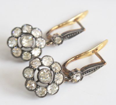 Lot 2180 - A pair of yellow and white metal diamond...