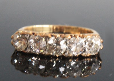Lot 2193 - A late 19th century yellow metal five-stone...