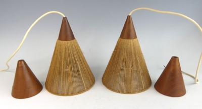 Lot 120 - A pair of 1960s Danish teak and raffia conical...