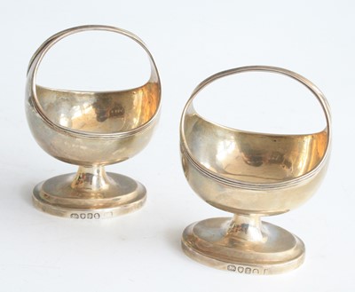 Lot 2091 - A pair of George III silver pedestal salt...