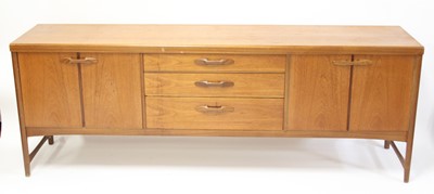 Lot 286 - A 1960s Nathan teak long sideboard, having...