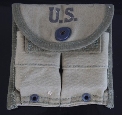 Lot 530 - A WW II U.S. carbine magazine pouch, stamped...
