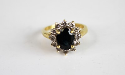 Lot 2182 - A yellow and white metal, sapphire and diamond...