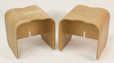 Lot 317 - A pair of 1970s curved plywood occasional...