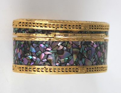 Lot 2243 - A continental mother of pearl and yellow metal...