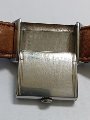 Lot 2209 - A gent's 1930s steel cased Reverso wristwatch,...