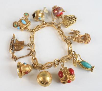 Lot 2260 - A yellow metal fancy stirrup shaped open link...