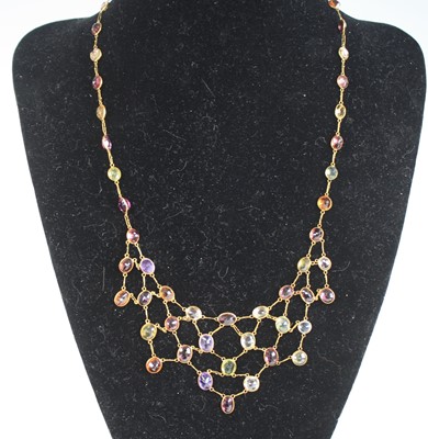 Lot 2256 - A yellow metal multi-stone fringe necklace,...