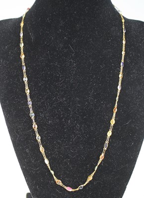 Lot 2272 - A yellow metal multi-sapphire...