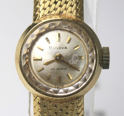 Lot 2312 - An 18ct yellow gold lady's Bulova manual wind...