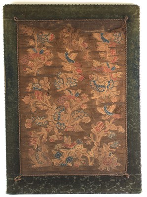 Lot 2326 - A 17th century silkwork appliqué panel, having...