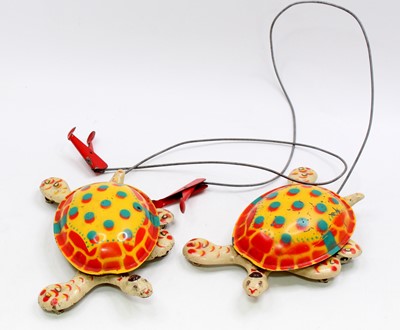 Lot 1617 - A pair of Mobo Toys 1950's tinplate Toy-Toise...