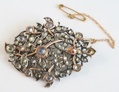 Lot 2501 - A Georgian white and yellow metal paste brooch...