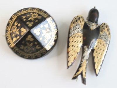 Lot 467 - Two pique tortoiseshell brooches, one in the...